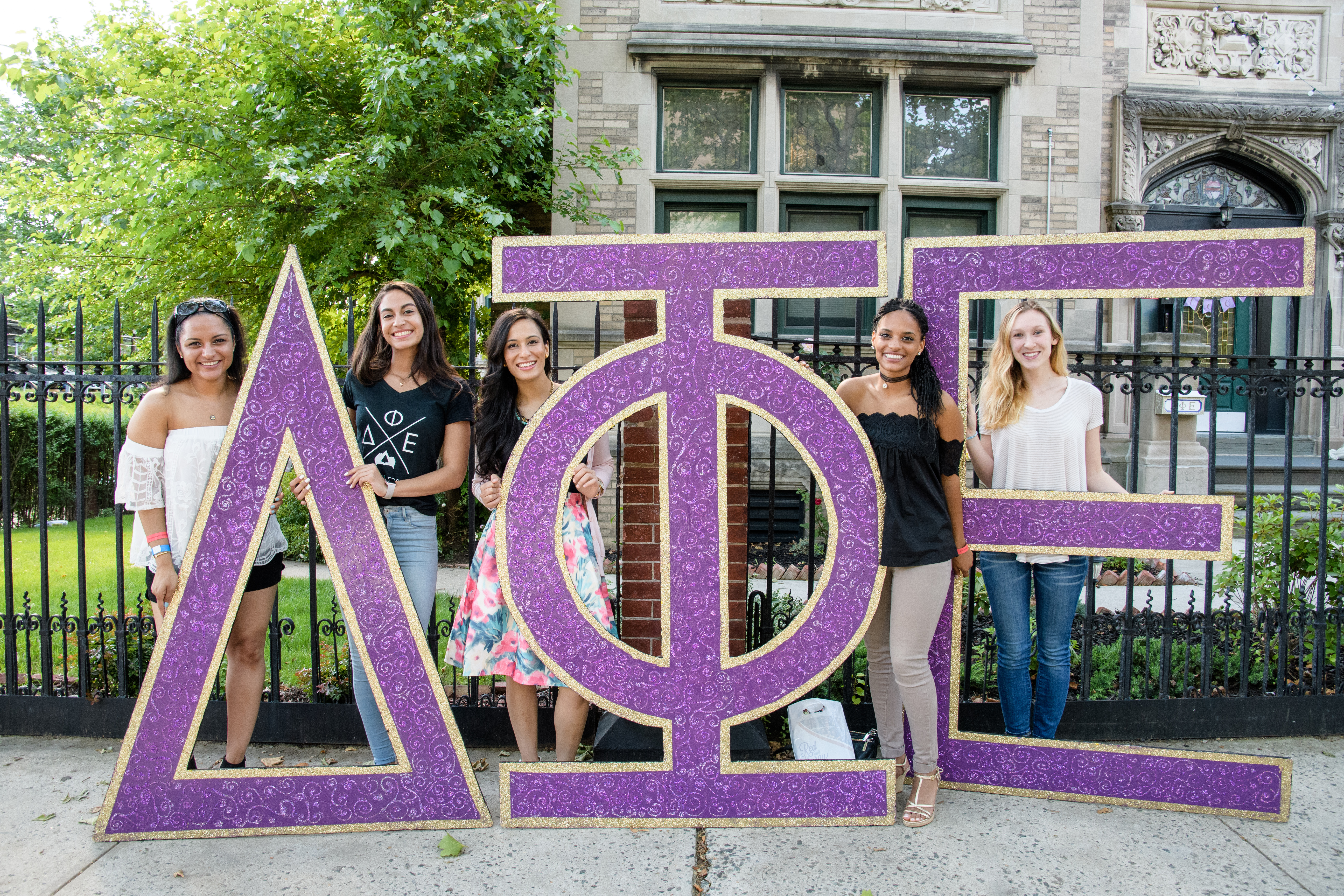 Female Greek Life students with letters