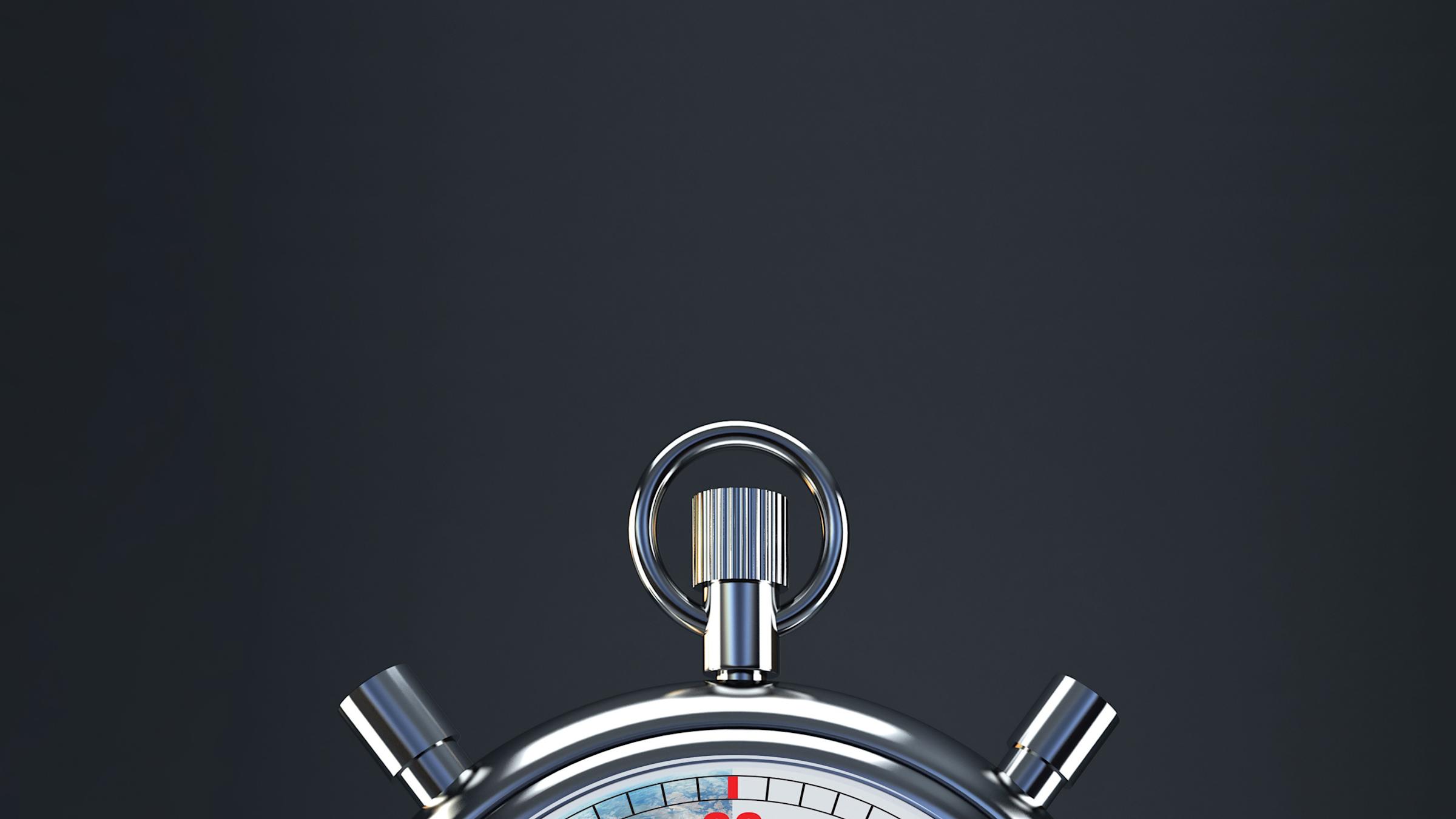 Stopwatch with earth in face showing 15 minutes left