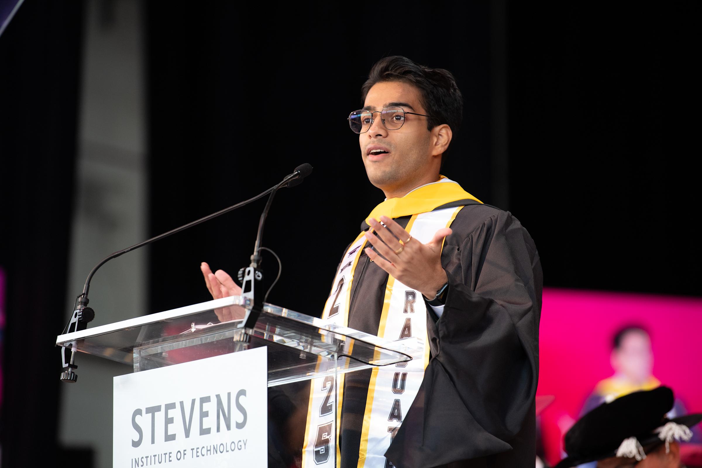 Graduate Commencement Student Speaker Bitla Aditya Jeetendra Reddy speaks from the podium.