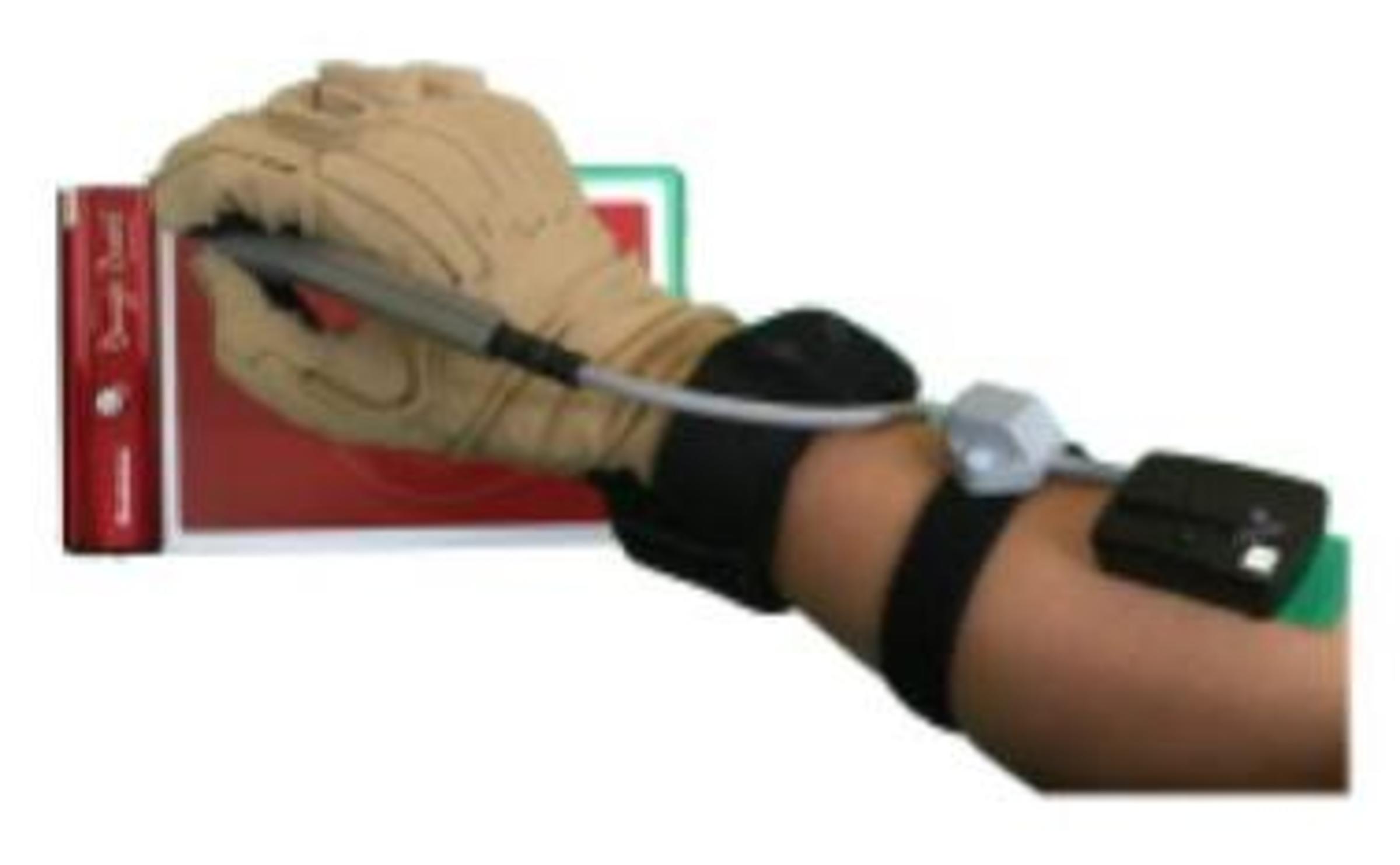 Patel using glove to write