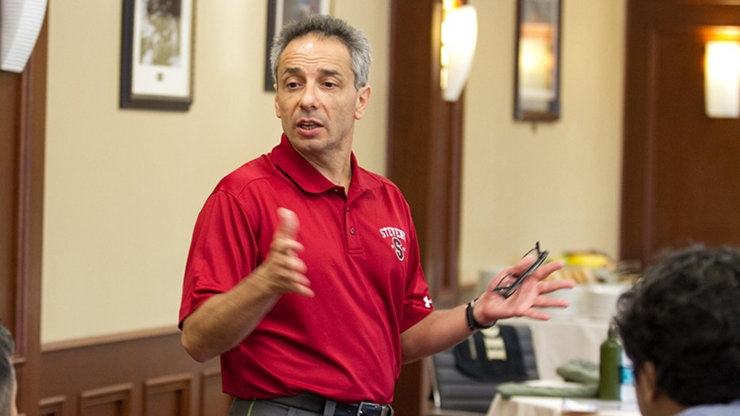 Dr. Peter Dominick teaching in a corporate boardroom in the Thayer Hotel, in West Point, NY.