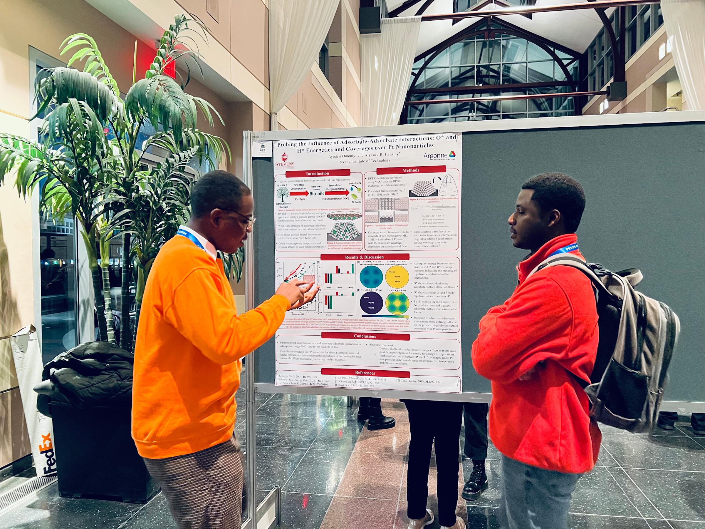 Chemical engineering Ph.D. student Ayodeji Omoniyi gives a poster presentation