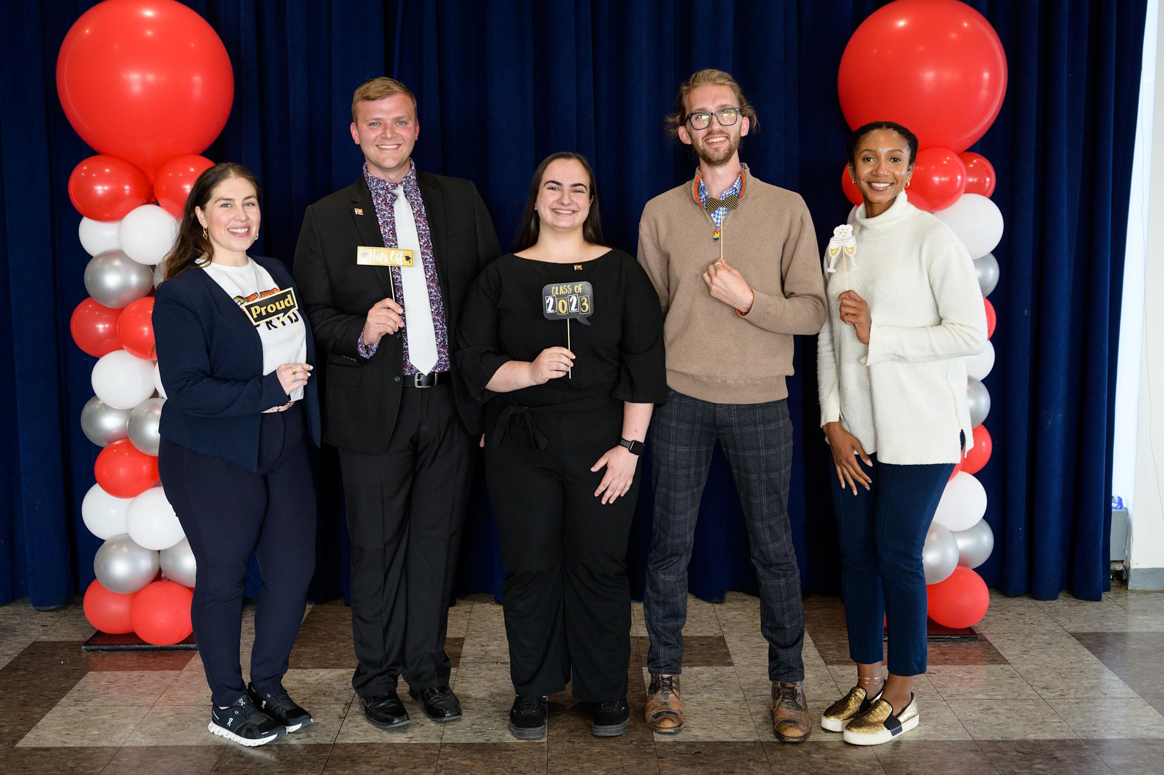 Photo of Liliana Delman, Director of DEI (left) with a group of students