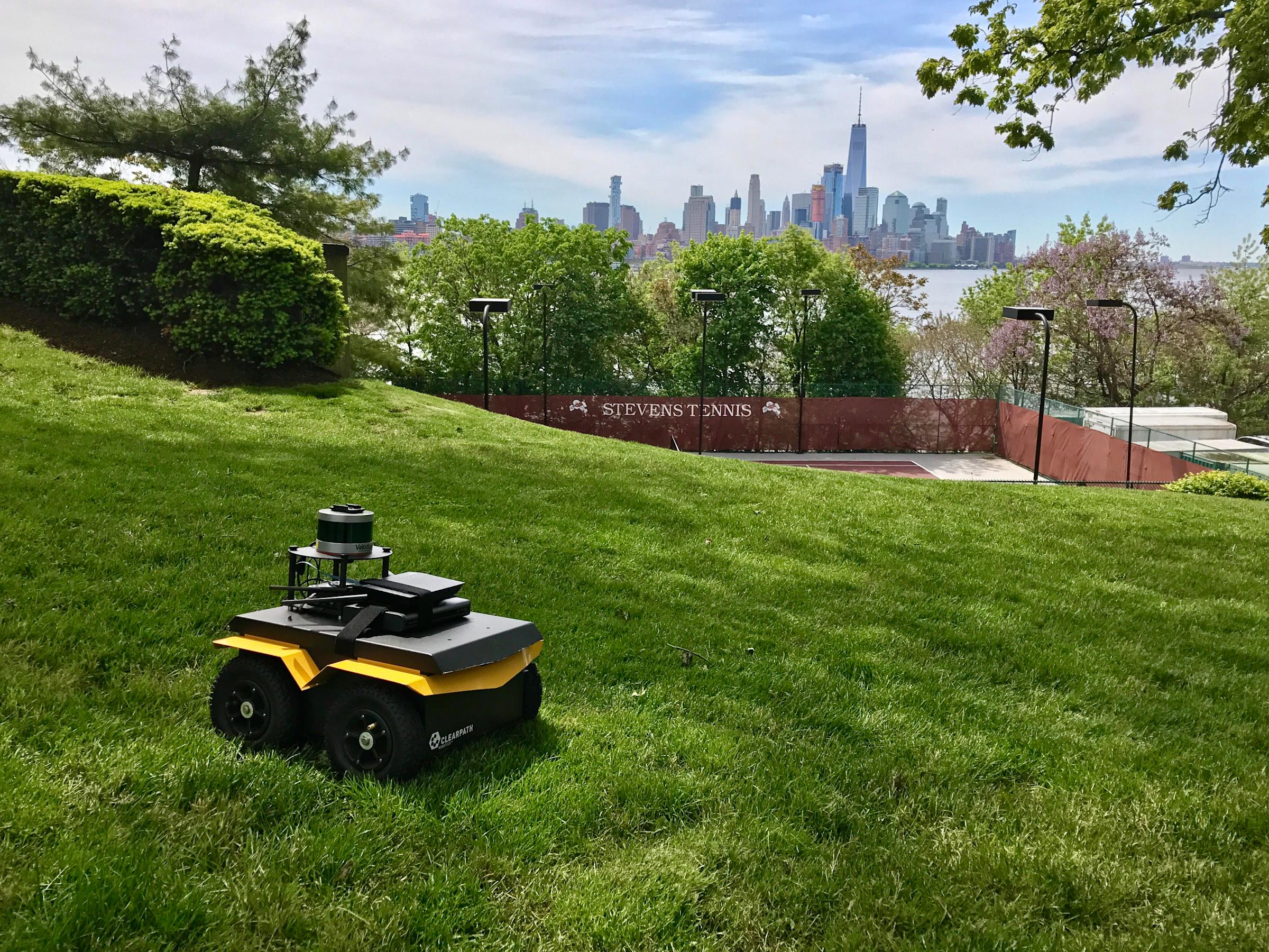 Yellow rolling robot vehicle on Stevens campus