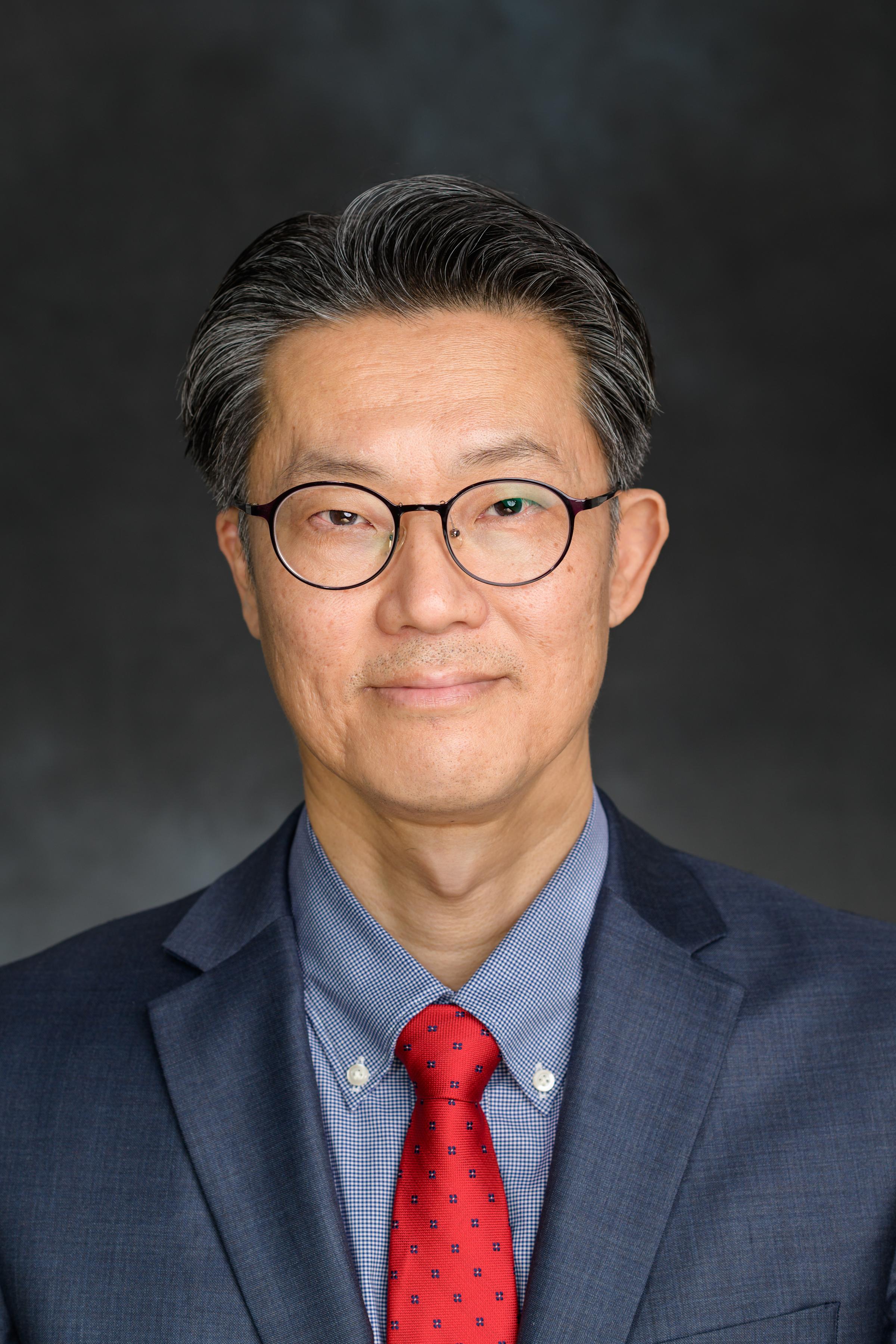 Professional headshot of Stevens professor E.H. Yang