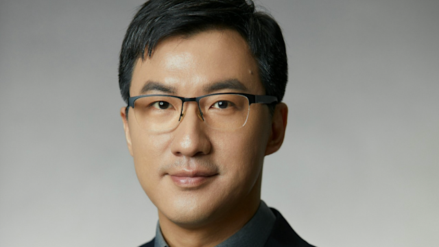 Ye Ouyang Ph.D. ’12 headshot