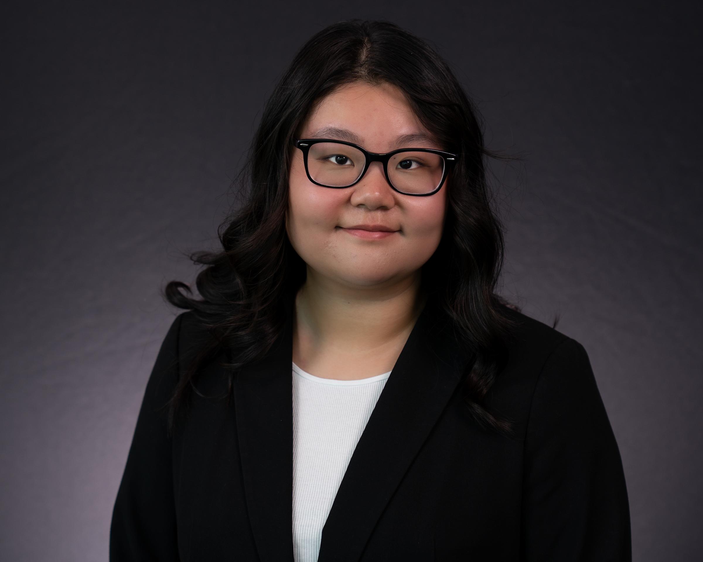 Headshot of Jenny Chen wearing professional attire.