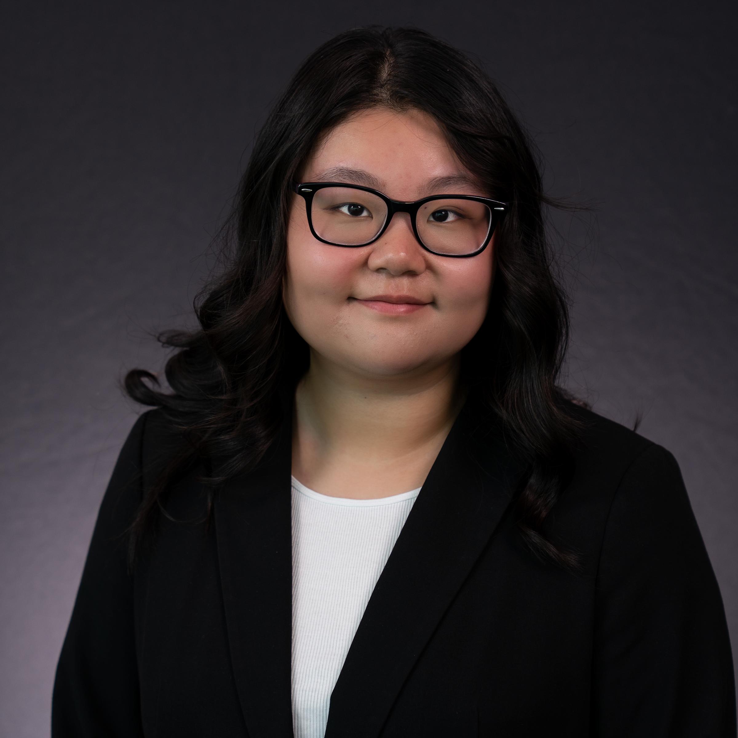 Headshot of Jenny Chen wearing professional attire.
