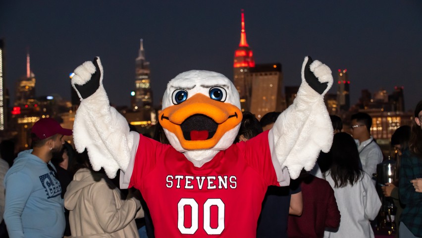 Attila in front of the Empire State Building when it was lit up in red for Stevens