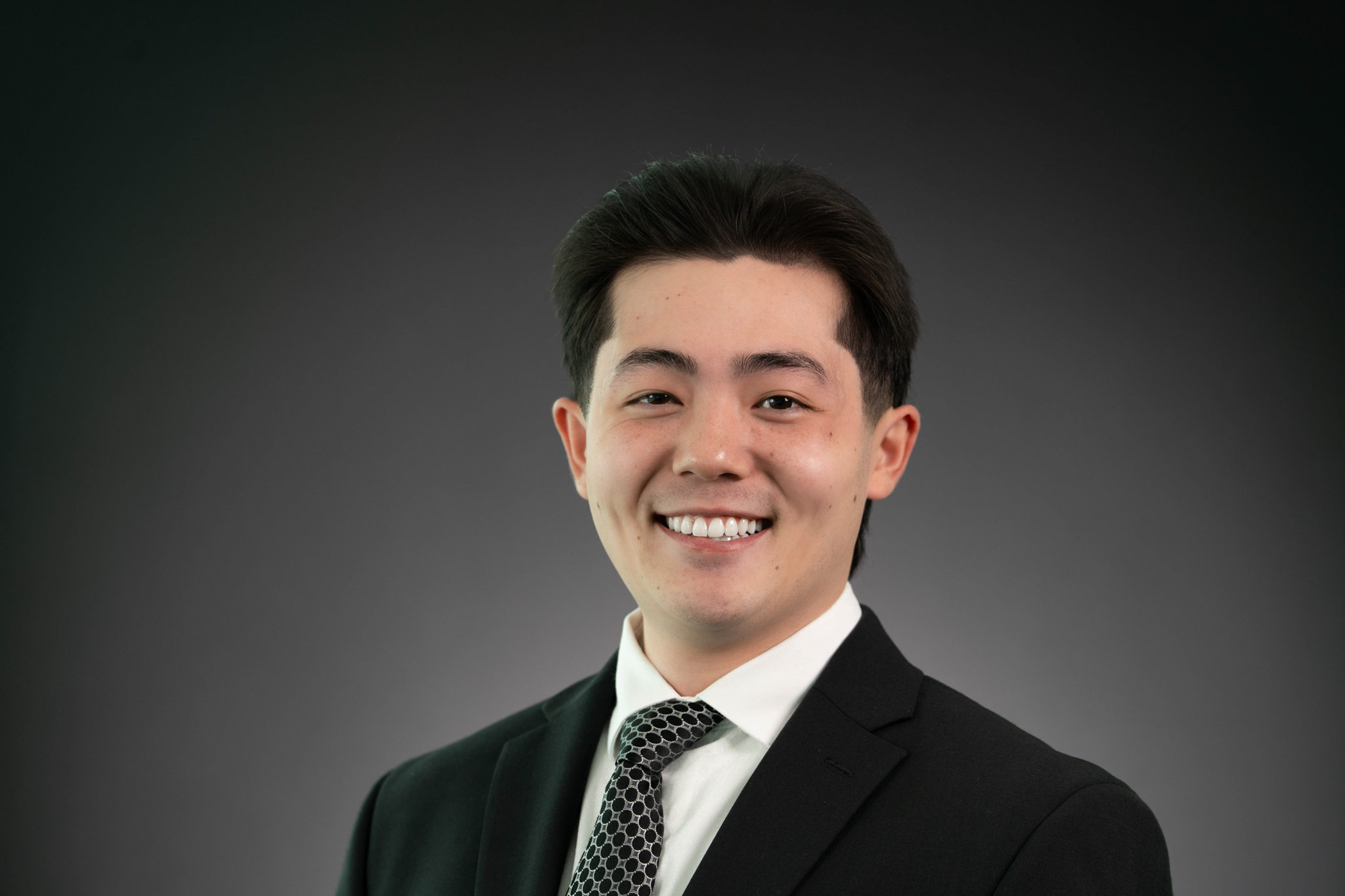 Headshot of Marcus Rocco in business attire