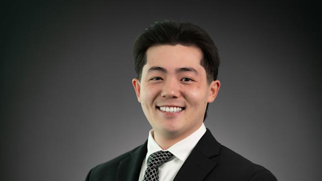Headshot of Marcus Rocco in business attire