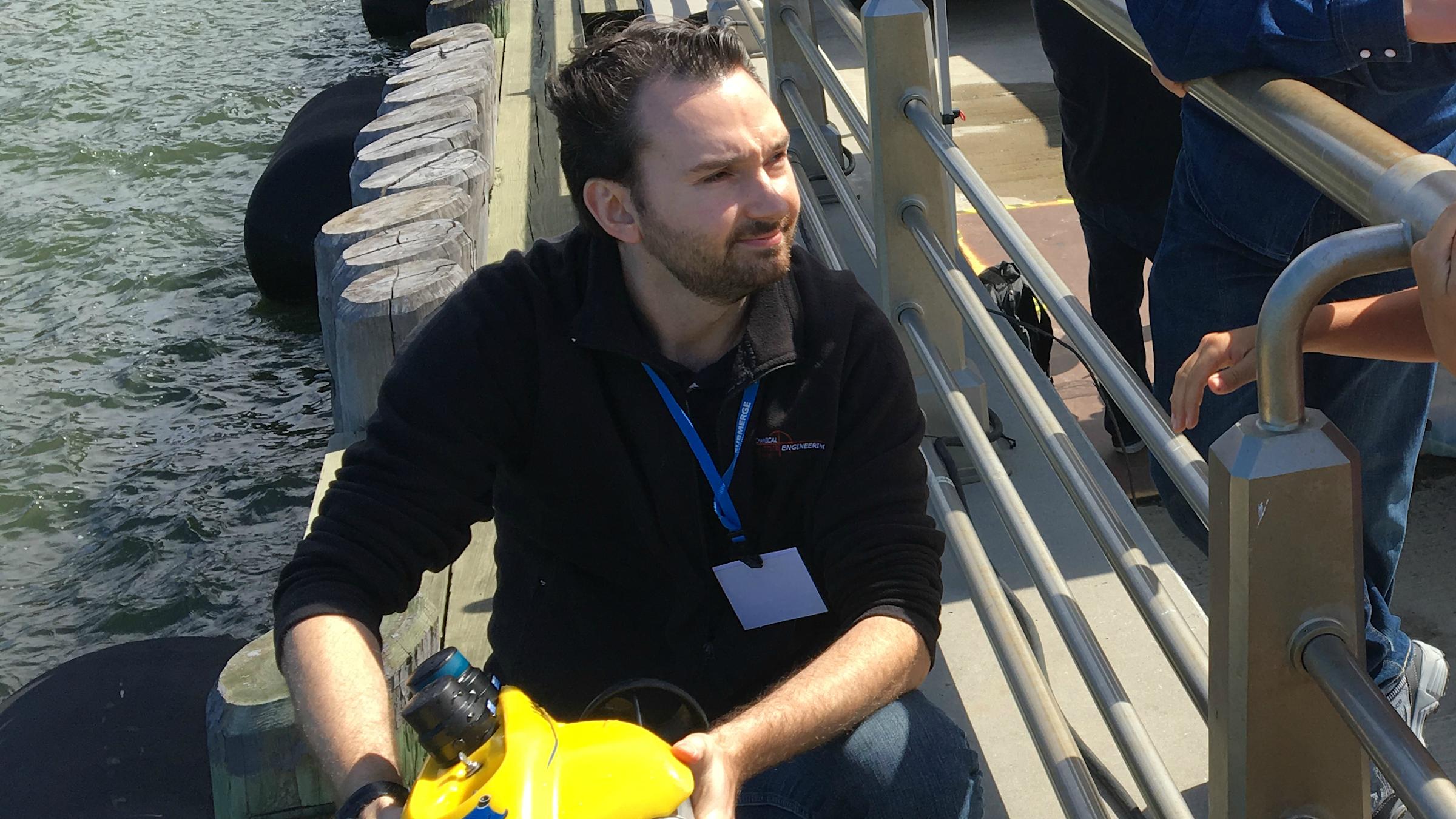 Stevens Professor Brendan Englot testing an underwater robot