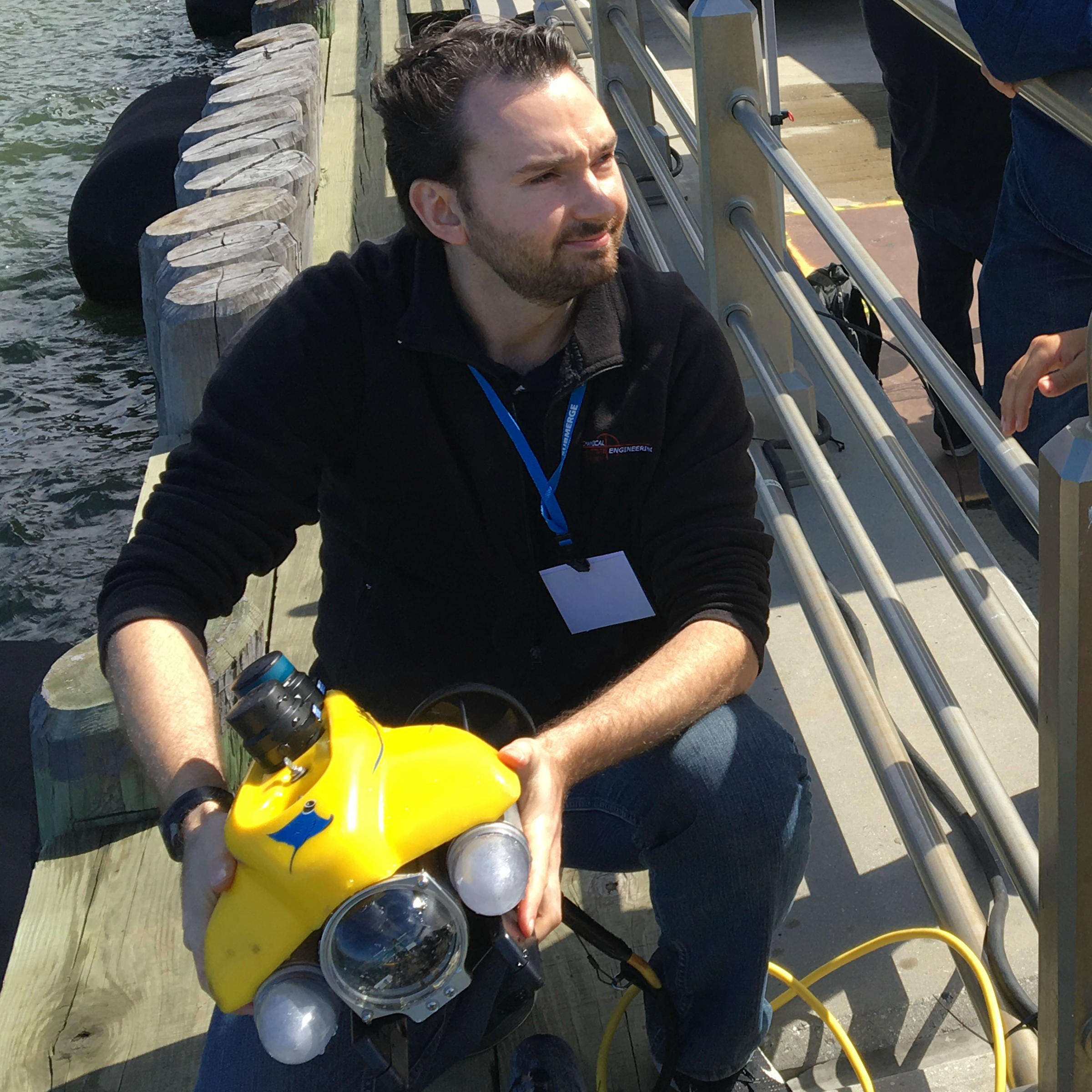 Stevens Professor Brendan Englot testing an underwater robot