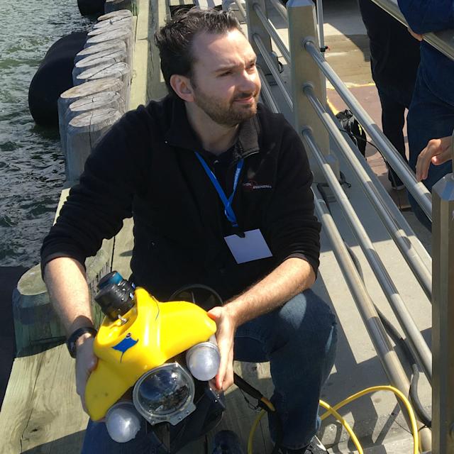 Stevens Professor Brendan Englot testing an underwater robot