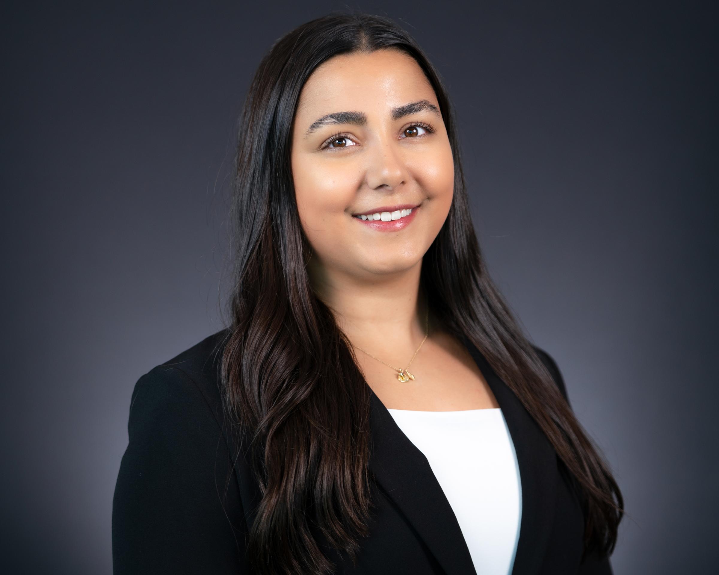 Headshot of Adriana Bertolotti in professional attire.