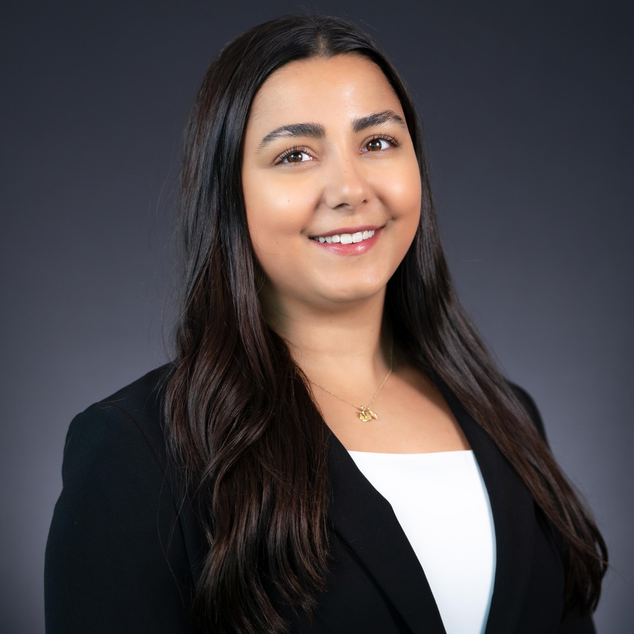 Headshot of Adriana Bertolotti in professional attire.