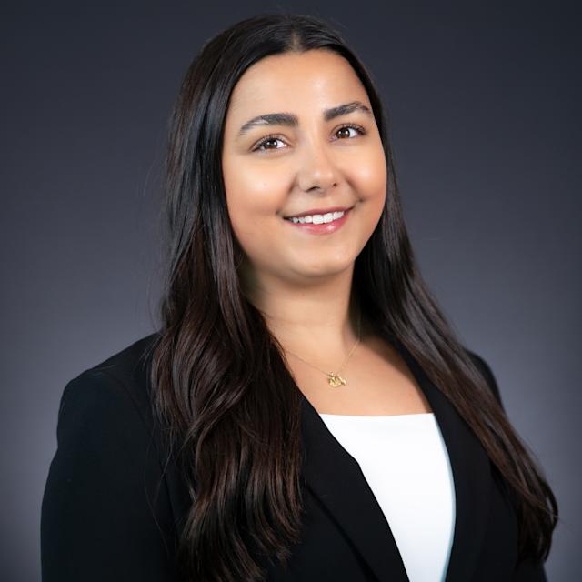 Headshot of Adriana Bertolotti in professional attire.