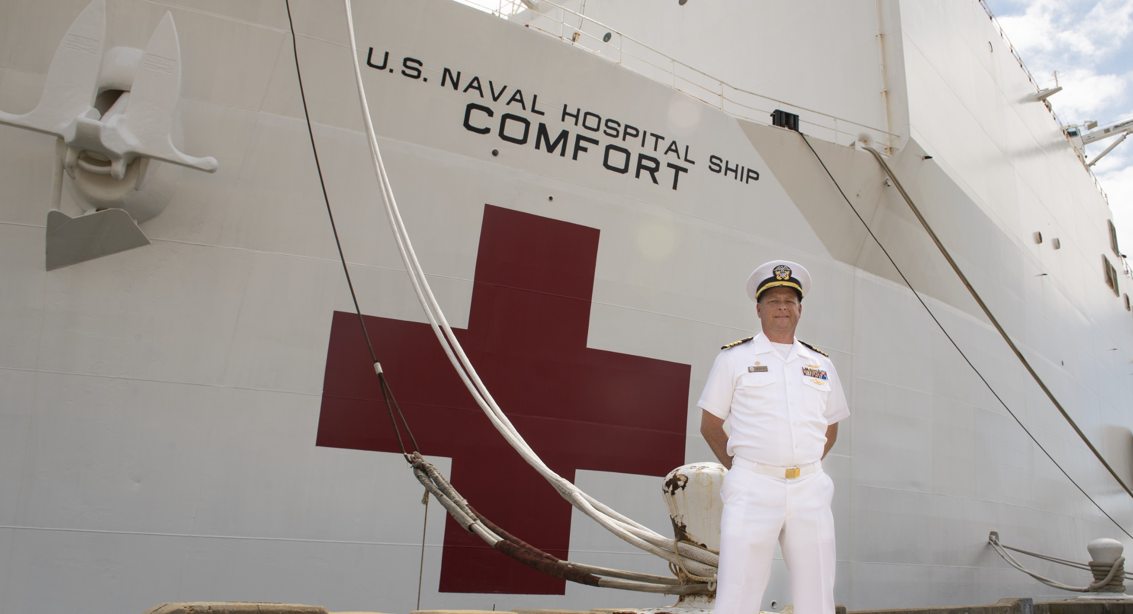 Stevens graduate Kevin Buckley outside the hospital ship Comfort