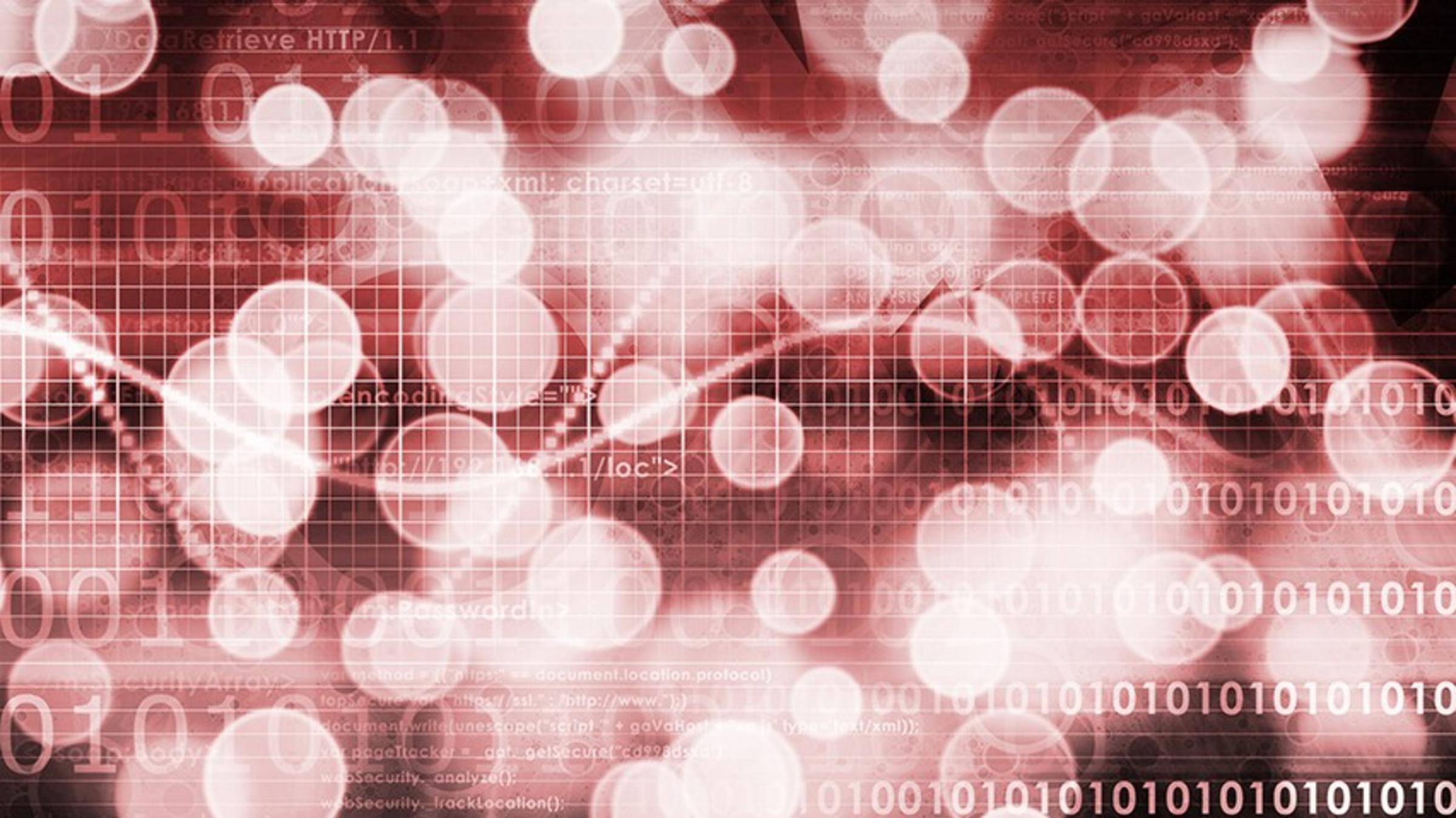 Data in a graph and binary code shown in pink and red on a dark screen.