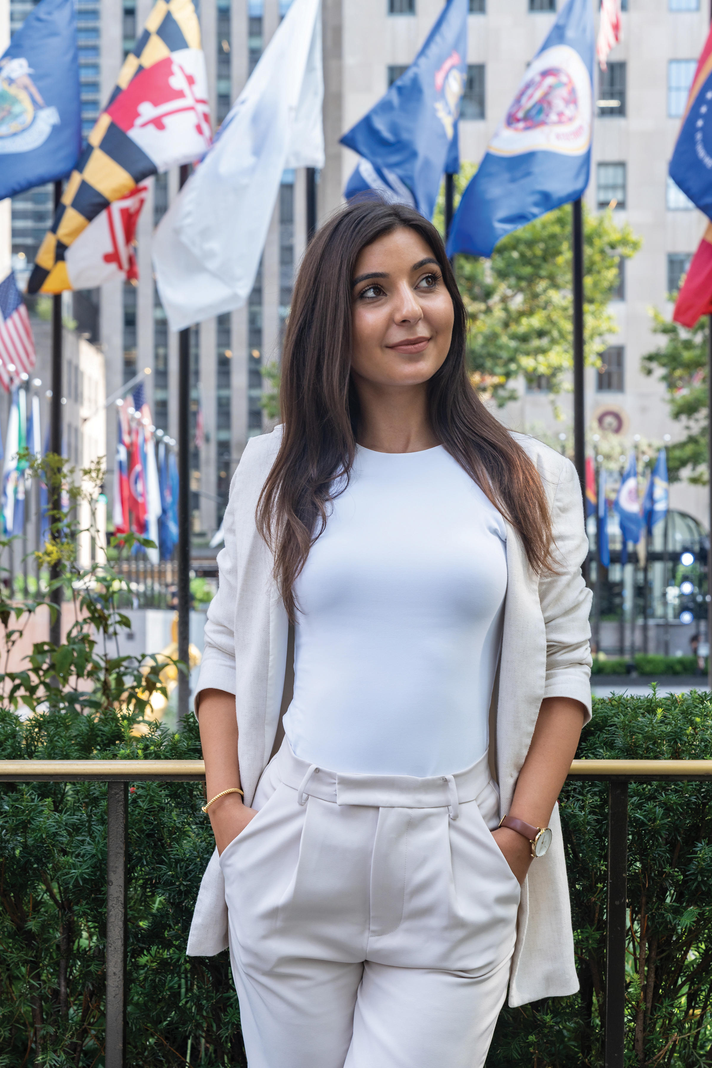 Ana Marija Micevska in front of Rockefeller Center flags.