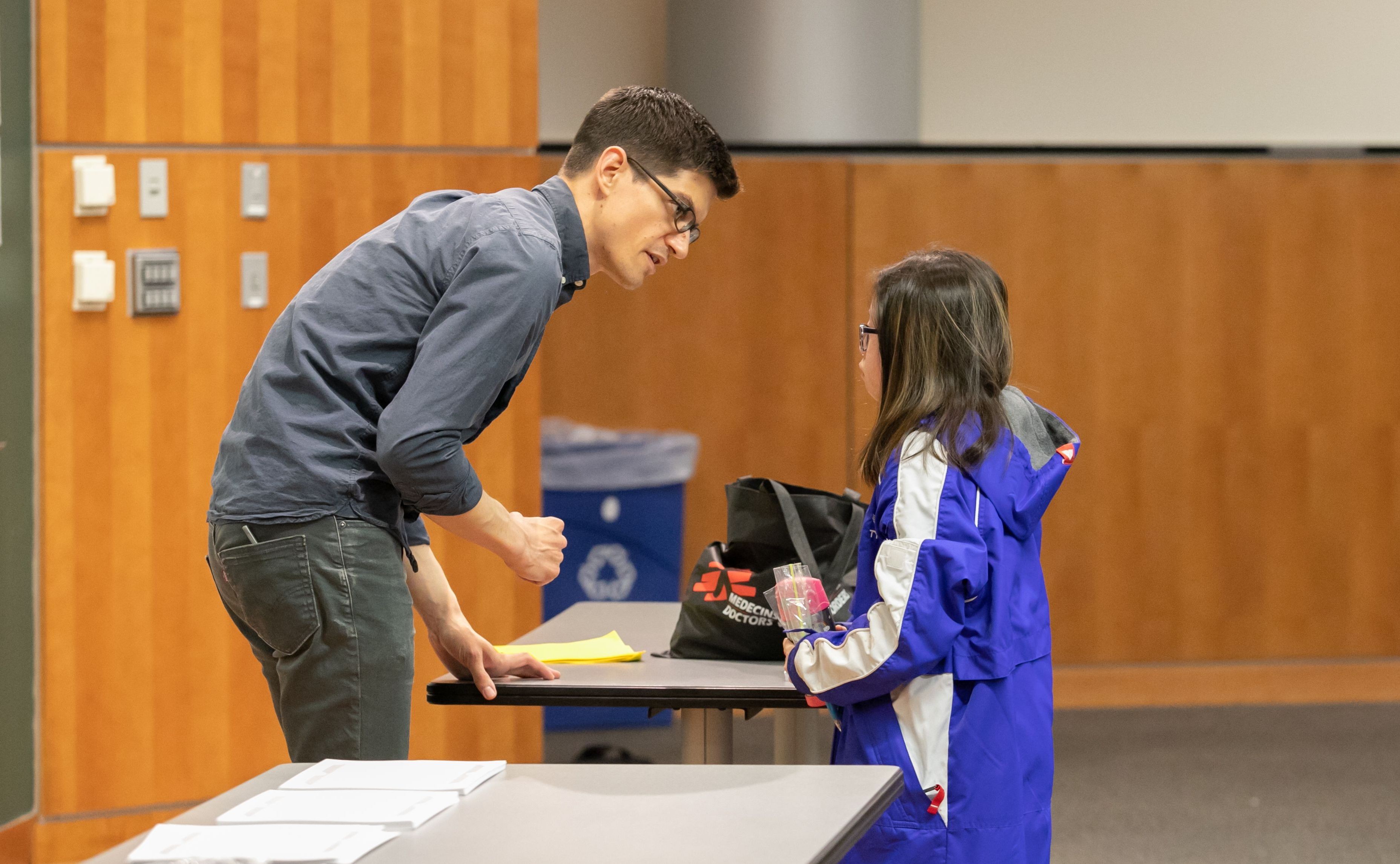 Jan Cannizo helps child 