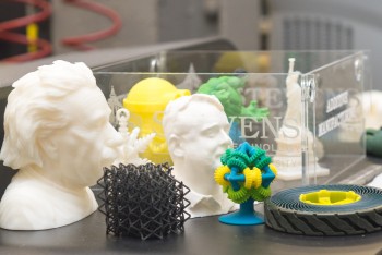 sculptures and gadgets on a table