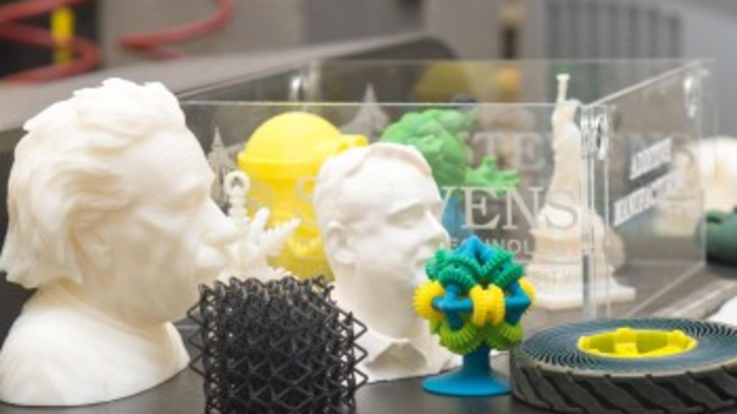 sculptures and gadgets on a table