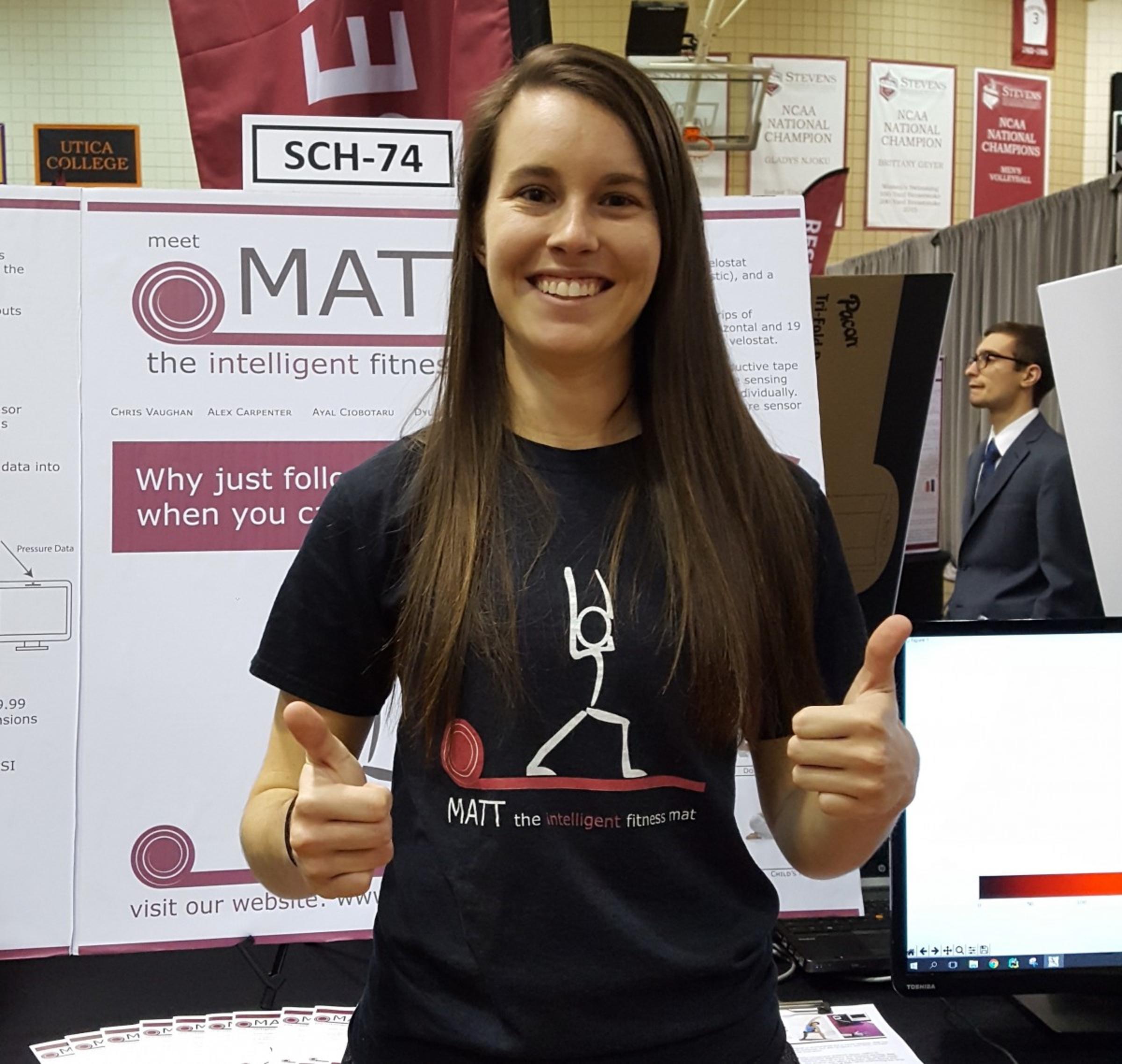 Sara Vitkus, 2017 Class Valedictorian, giving a thumbs-up at Stevens Annual Innovation Expo