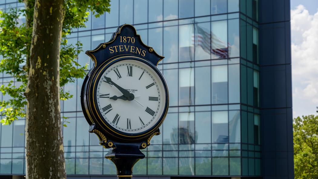 Stevens clock with University Center Complex in the background