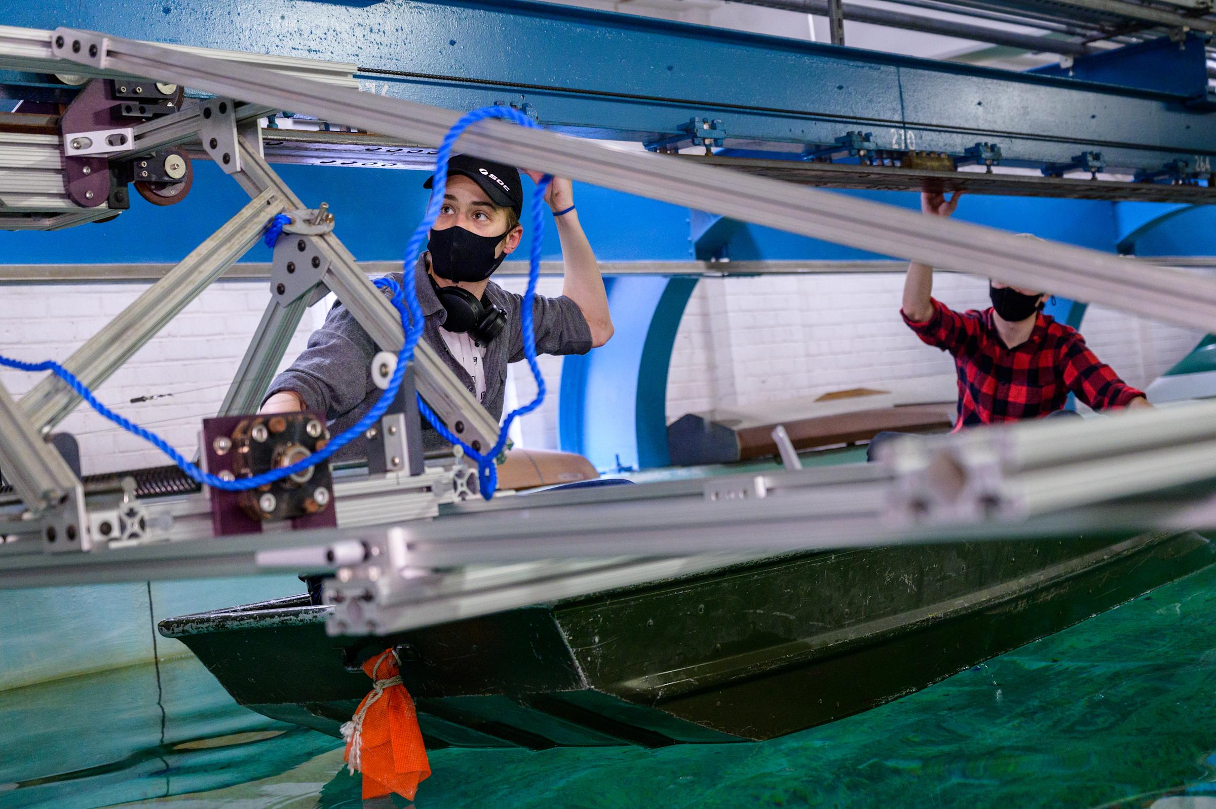 boat being tested in davidson lab towing tank