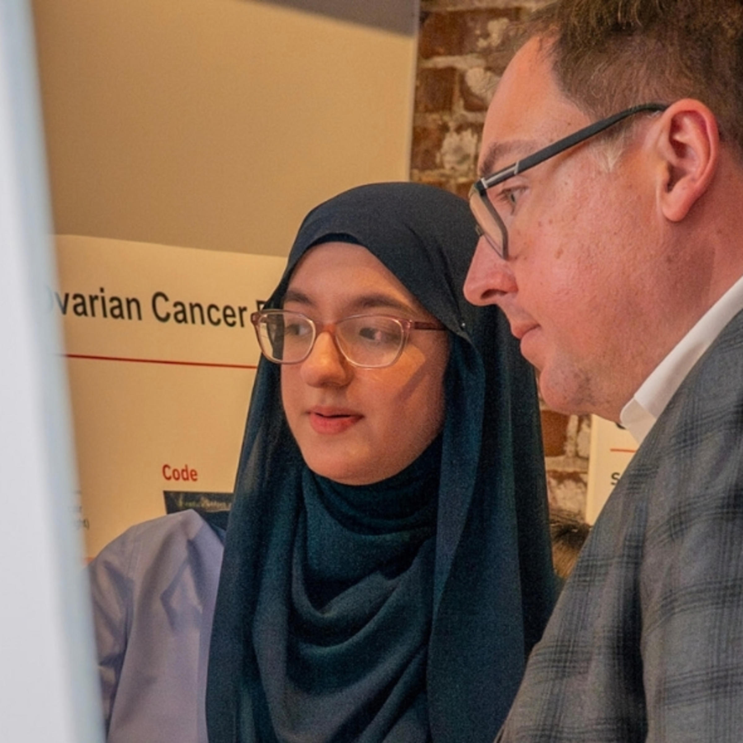 Student presenting poster.