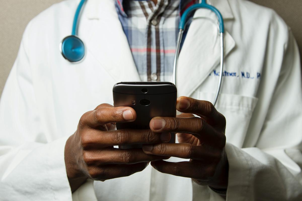 Doctor with cellphone