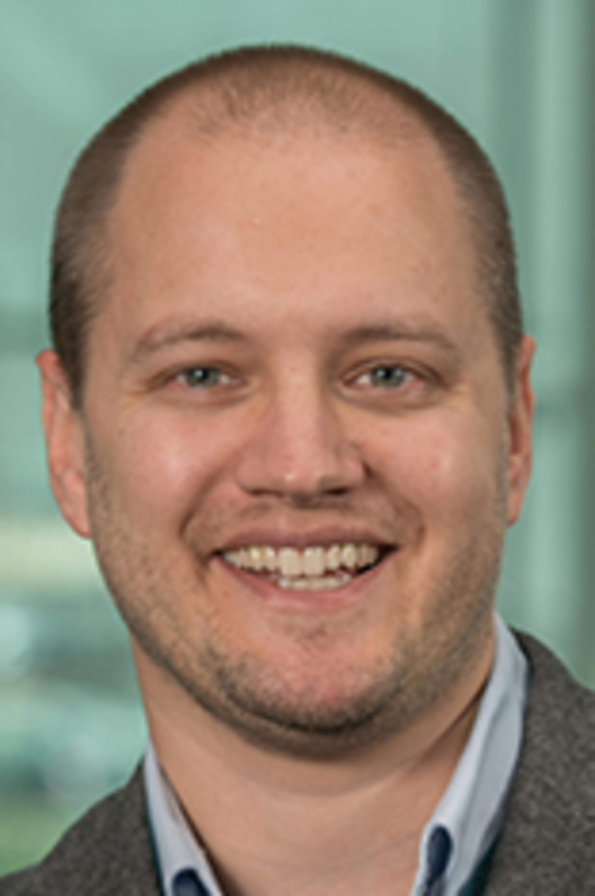 Headshot of Prof. Aron Lindberg