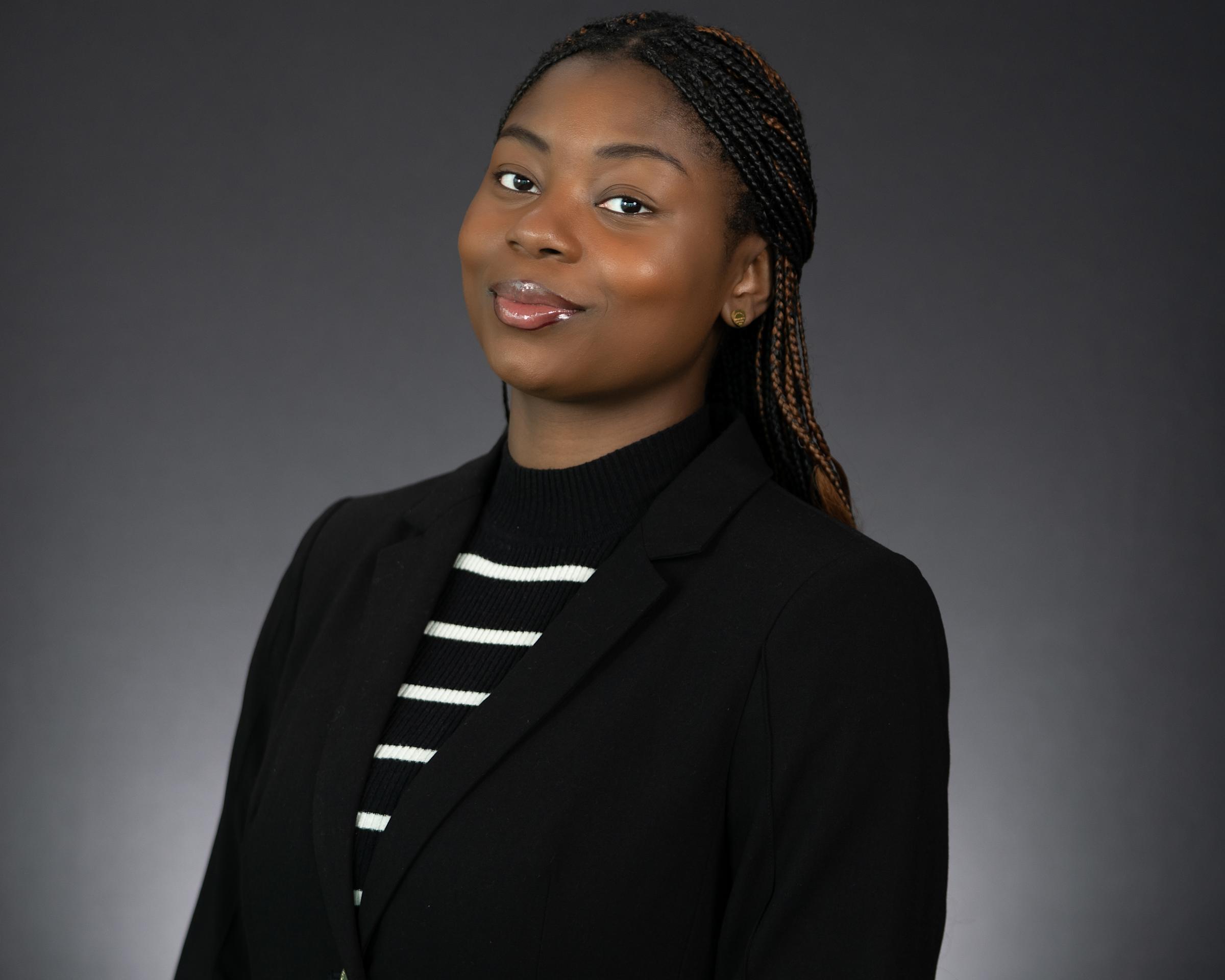 Headshot of Victoria Okonkwo wearing professional attire.