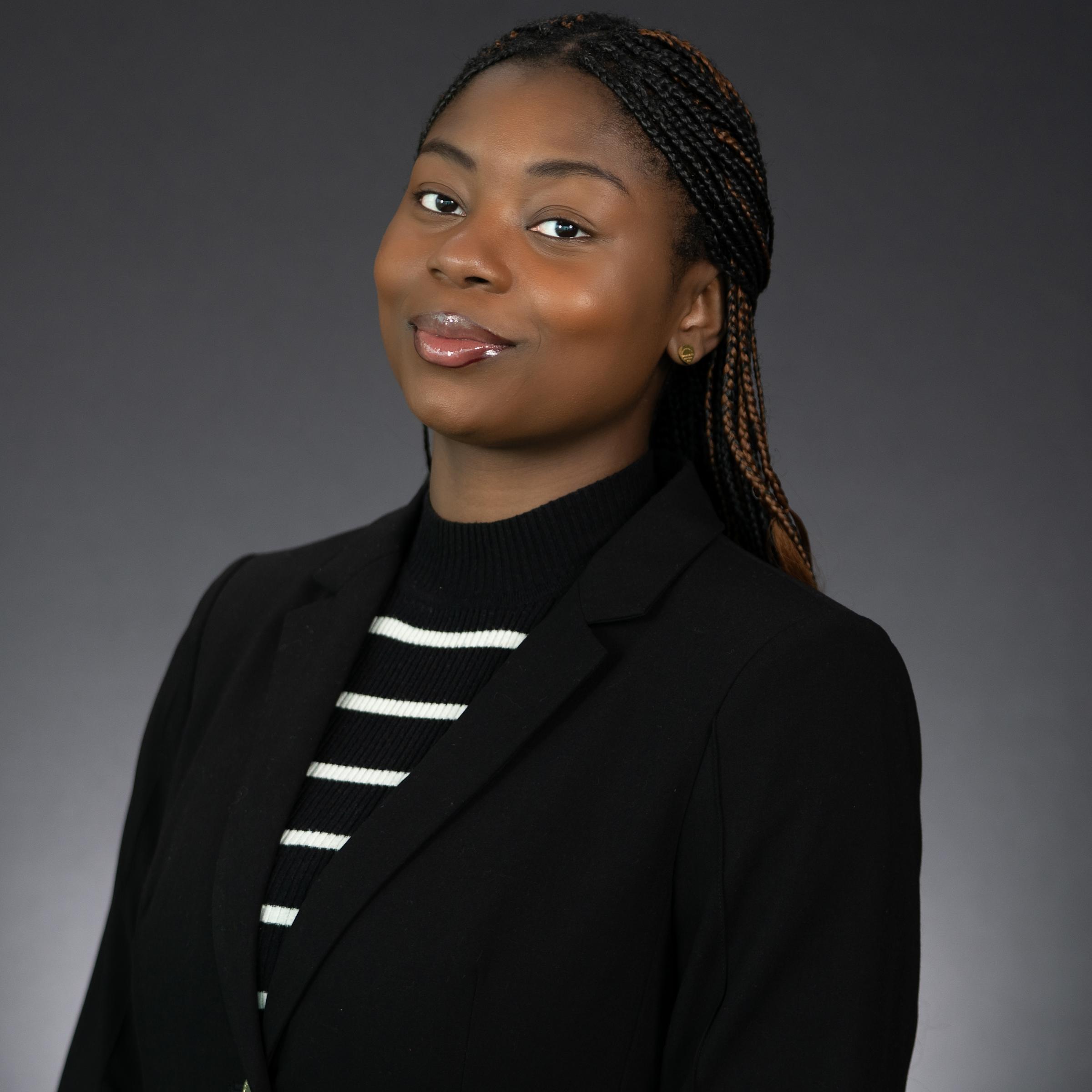 Headshot of Victoria Okonkwo wearing professional attire.