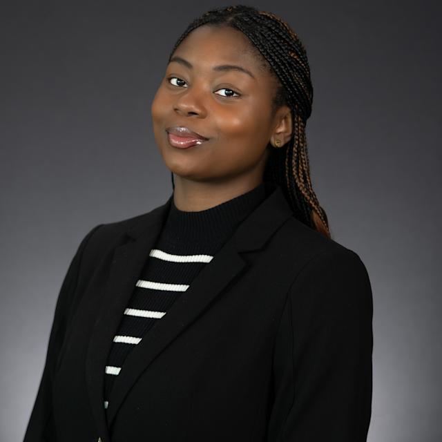 Headshot of Victoria Okonkwo wearing professional attire.
