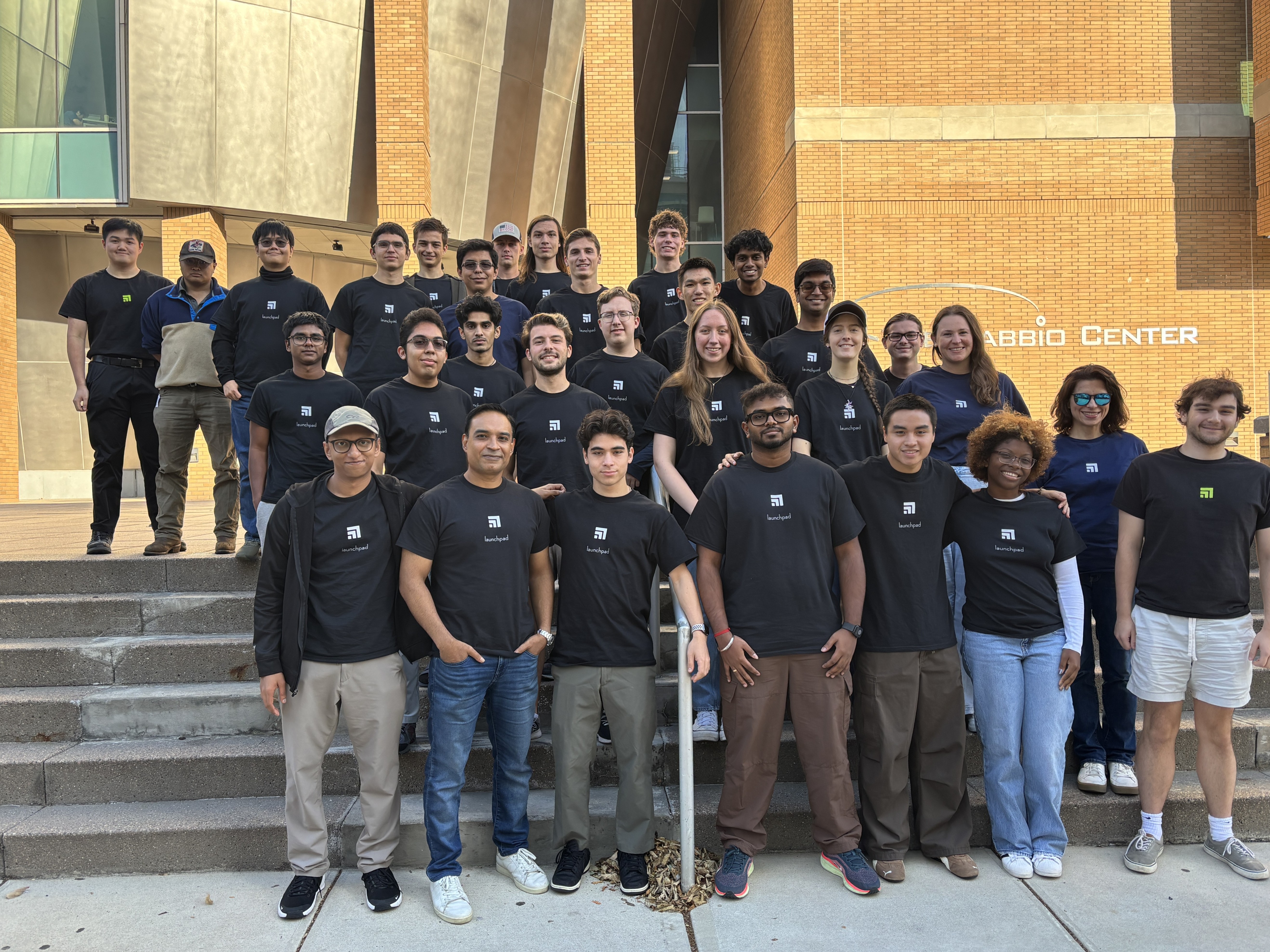 Launchpad at Stevens participants stand on the steps of Babbio
