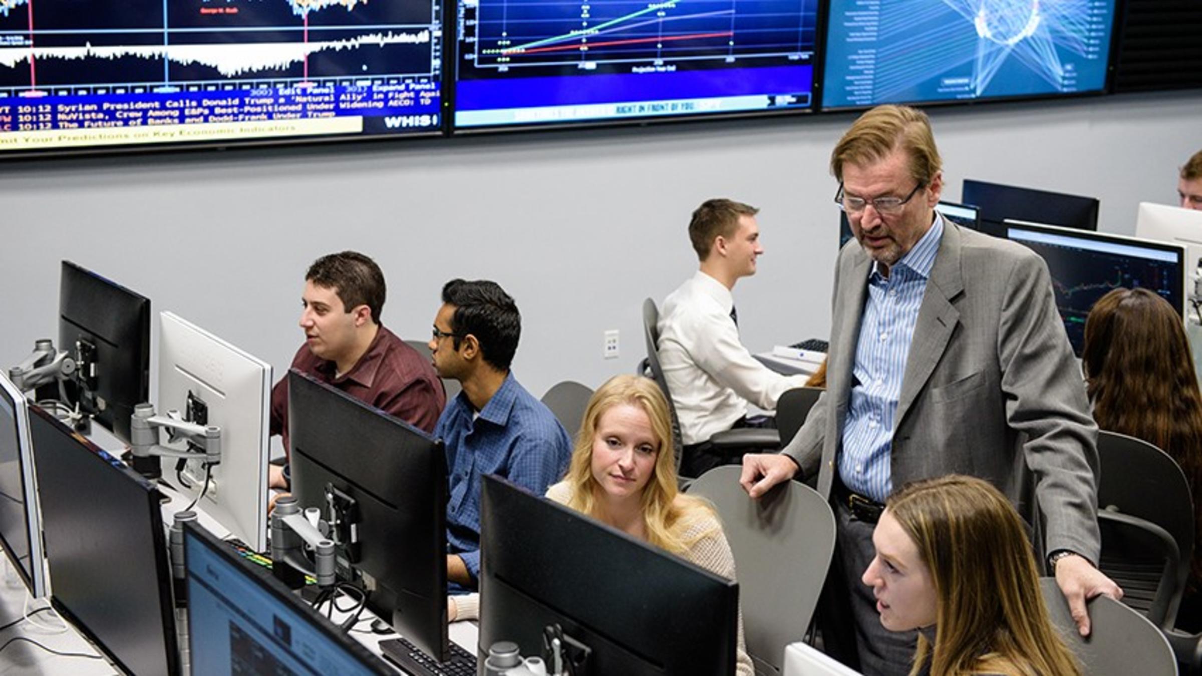 Students in a graduate finance class held in the Hanlon lab.