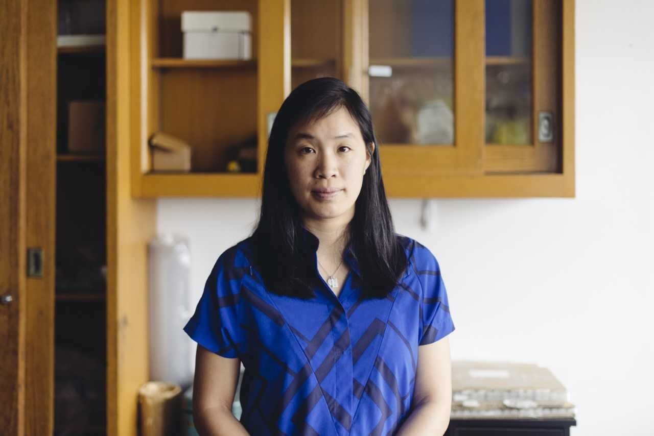 Professor Stephanie Lee sitting in her laboratory