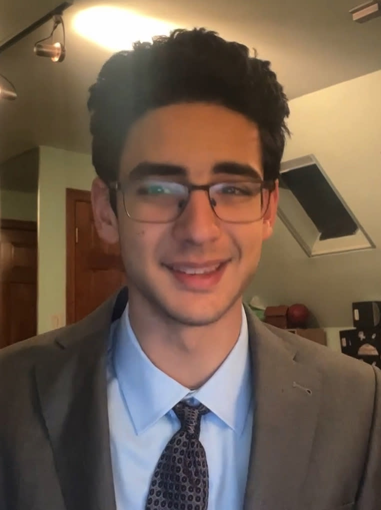 Noah Rozin sits in front of his computer.