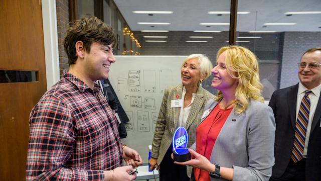 Student receives iStem @ Stevens recognition from three professionals