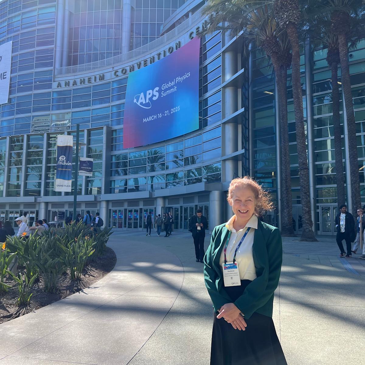 Professor Svetlana A. Malinovskaya at the APS Global Physics Summit 2025 in Anaheim, outside the convention center and smiling at the camera
