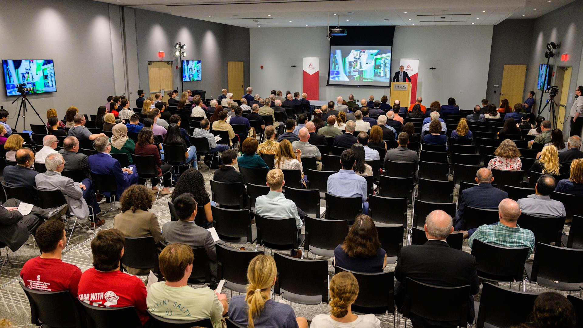 A crowd of attendees at a seminar at UCC.