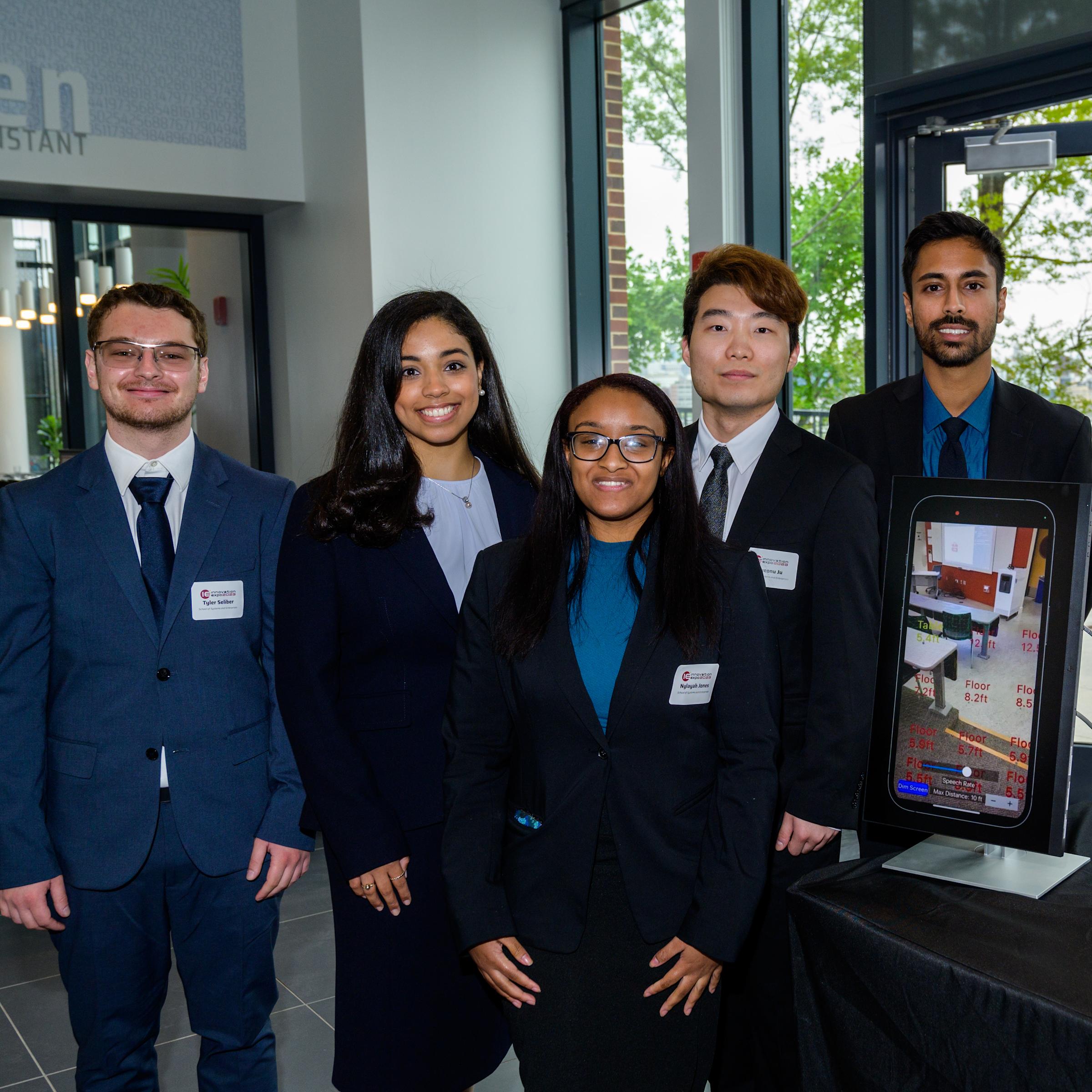 The Software Engineering GuiDAR team at the 2023 Innovation Expo. From left to right: Tyler Seliber, Francesca Severino, Nylayah Jones, Hyeonu Ju and Mehrab Syed.