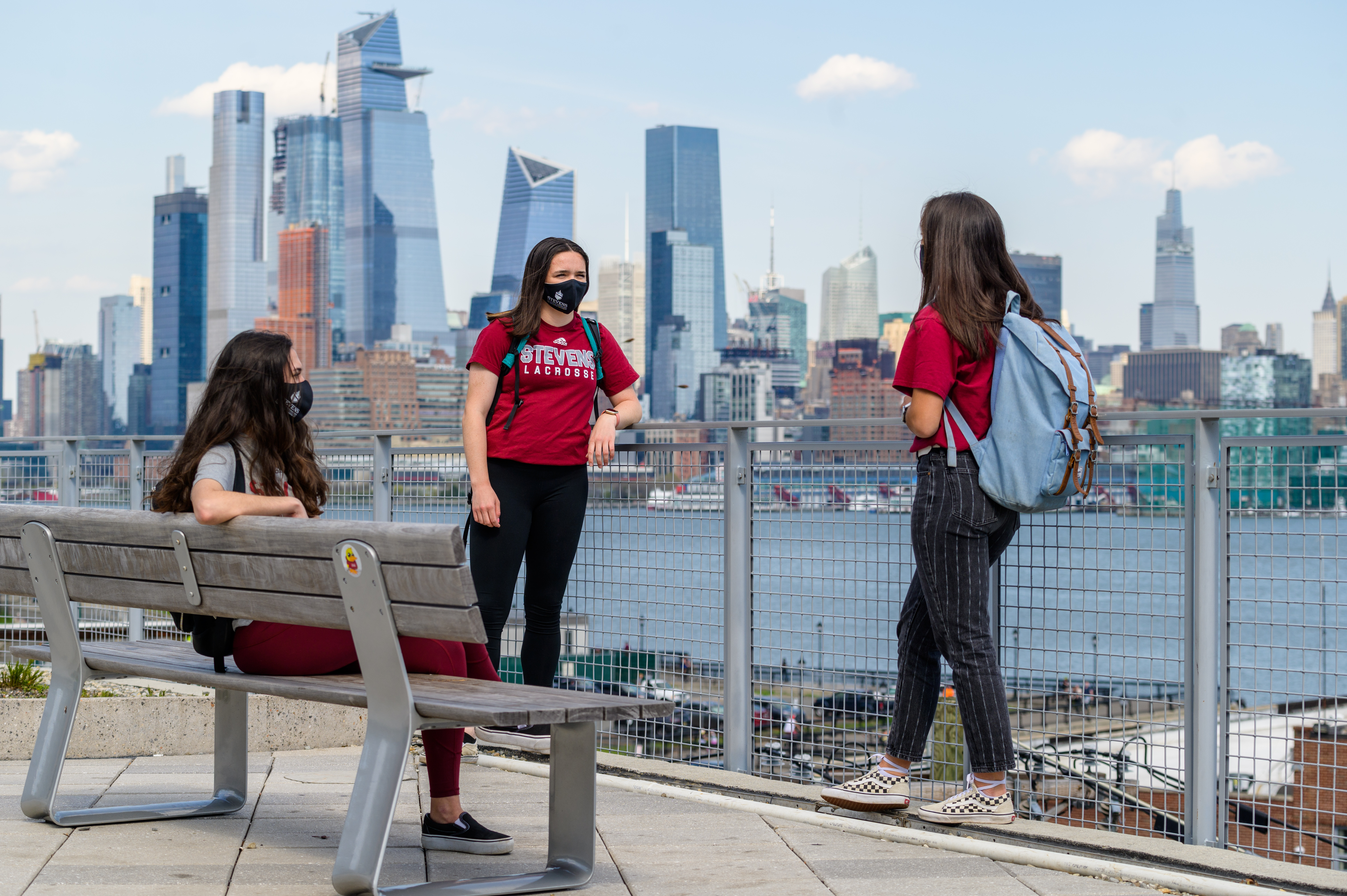 Female students in the Babbio Center courtyard.