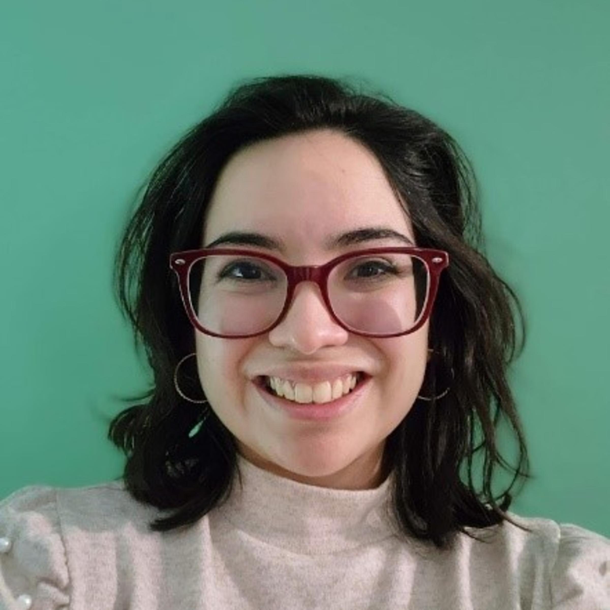 A headshot of a woman.