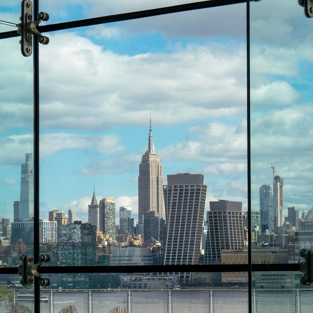 NYC Skyline through Babbio Center's Atrium Windows