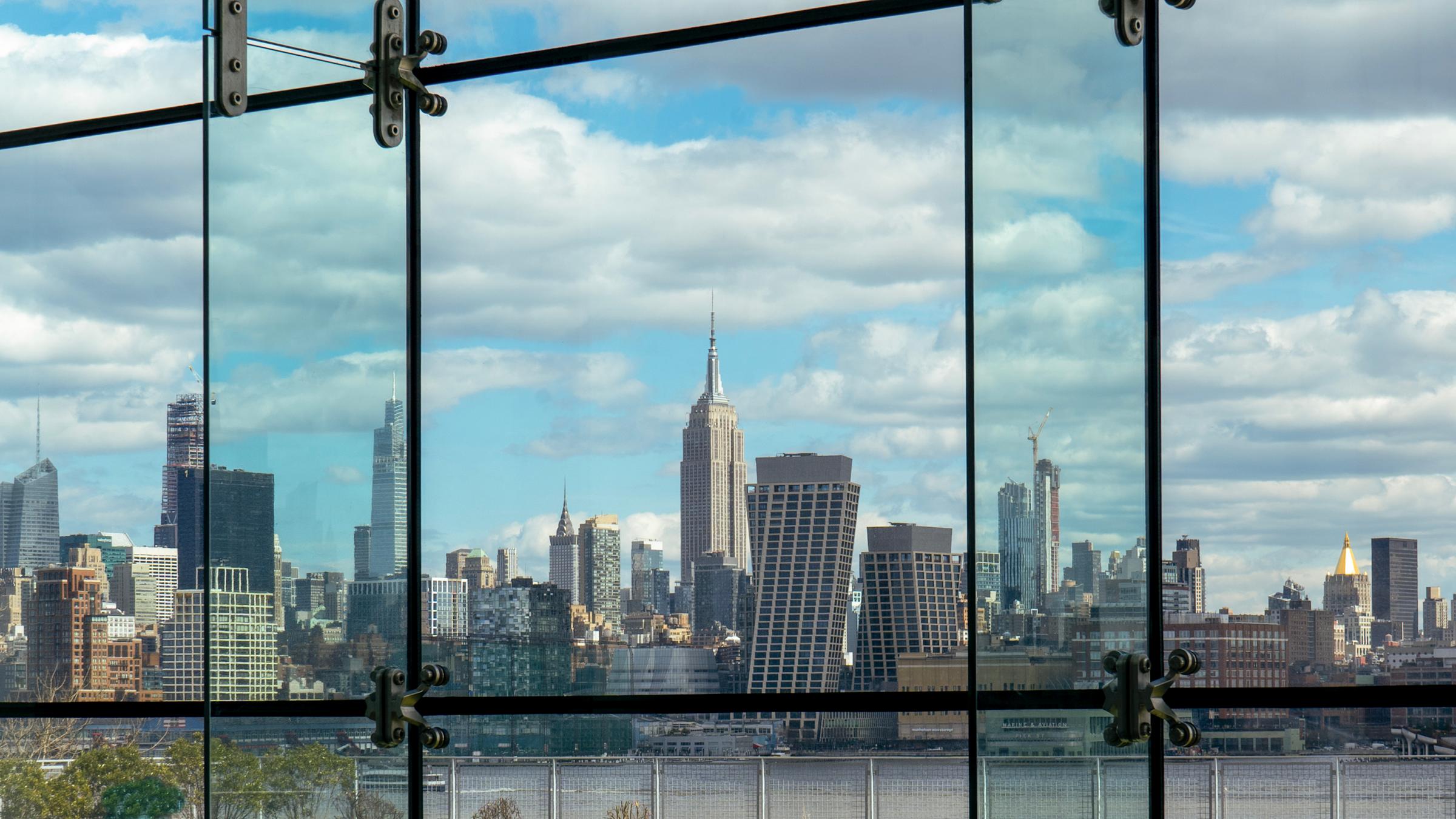 NYC Skyline through Babbio Center's Atrium Windows