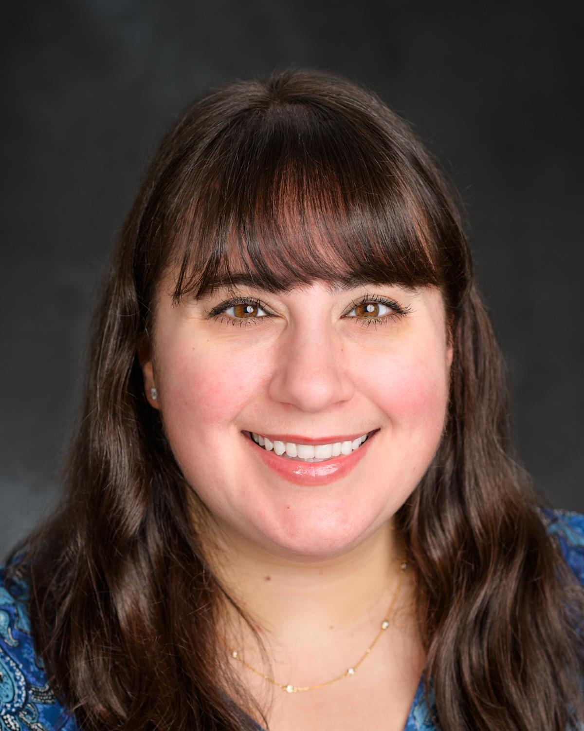 A headshot of Carson Bongo, our Web Manager