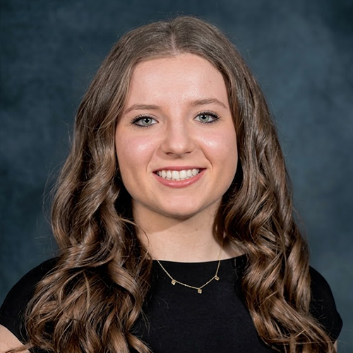 Headshot of Diana Strama wearing professional attire.